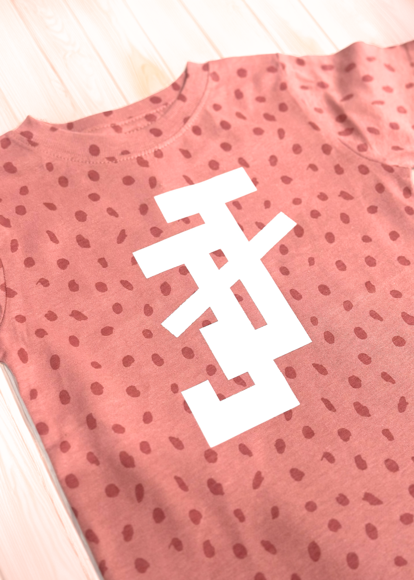 jack and jill of america pink toddler shirt with dot print and white jj logo