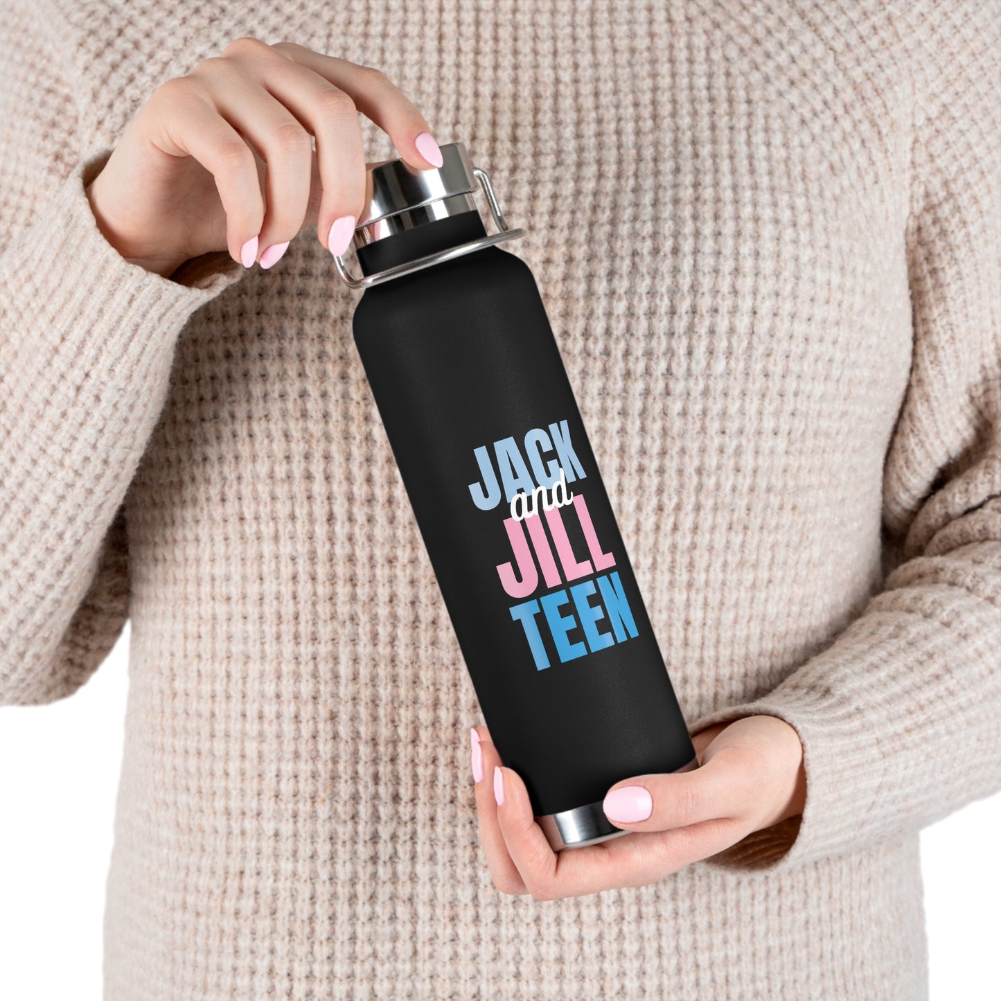 Person holding a black water bottle with 'Jack and Jill Teen' text