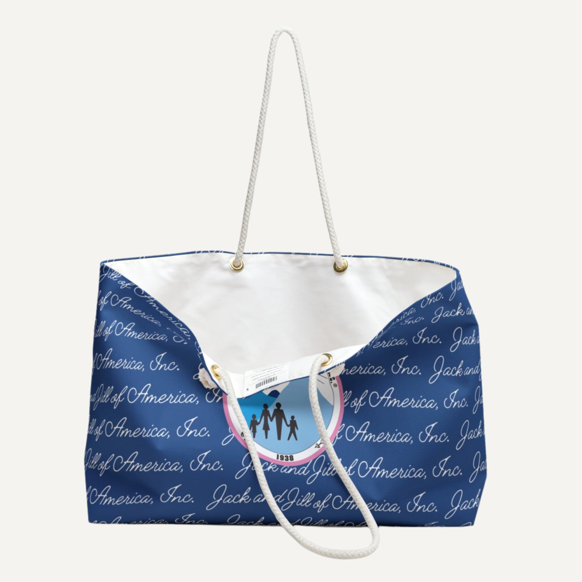 Blue jack and jill of america weekender tote bag with white text and a white rope handle on a background