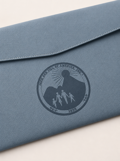 Jack and Jill of America Folder - close up view of embossed Jack and Jill logo on PU leather folder for Jack and Jill of America gift