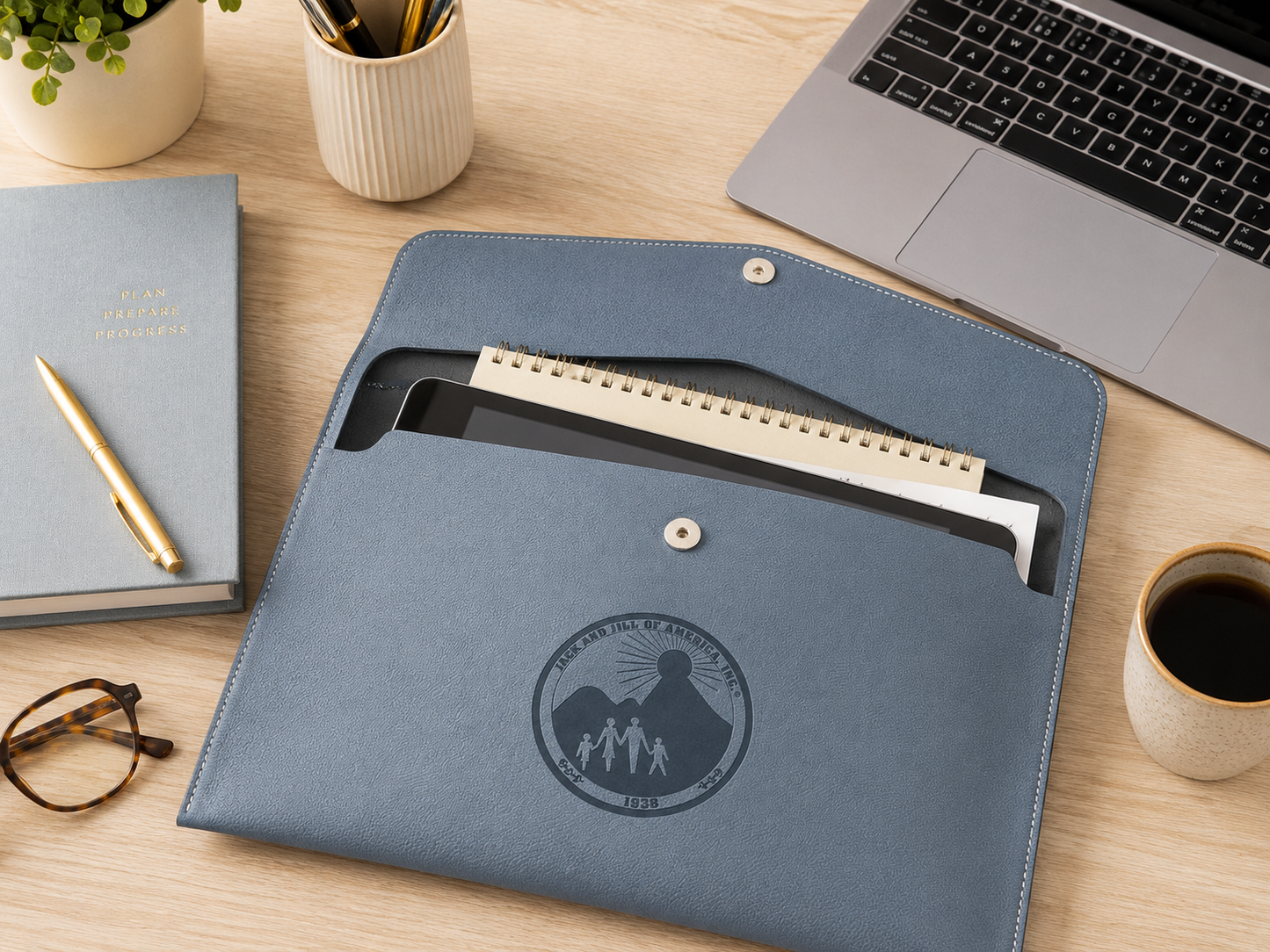 Jack and Jill of America Folder - lifestyle view on desk of embossed Jack and Jill of America logo on PU leather document folder for Jack and Jill of America gift