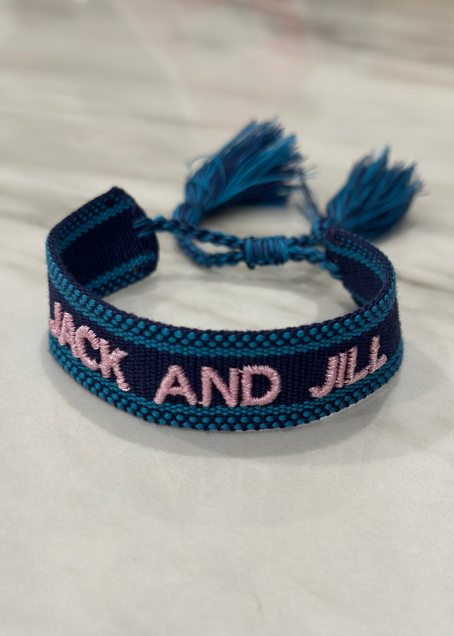 jack and jill of america navy blue woven bracelet with pink embroidery
