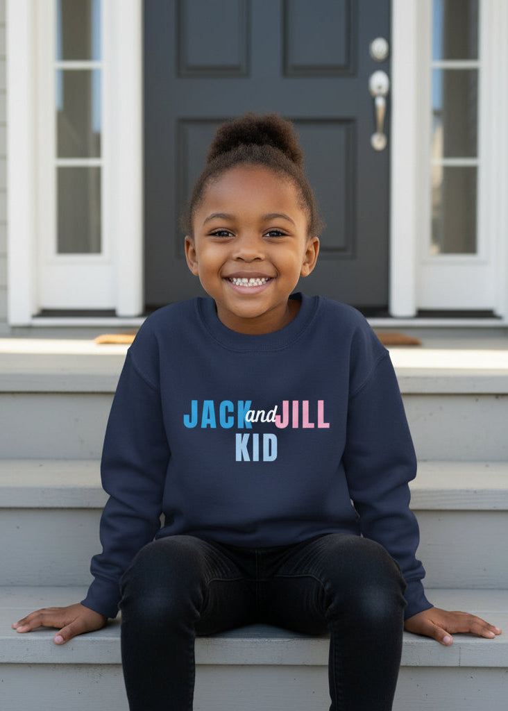 Child wearing a navy blue sweatshirt with 'Jack and Jill Kid' text, sitting on steps outside a house.