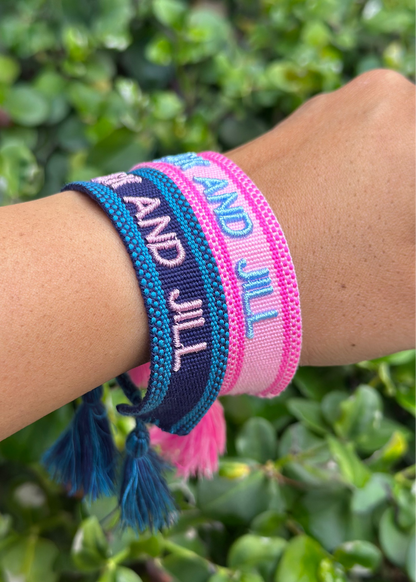 jack and jill of america pink and blue woven bracelets layered