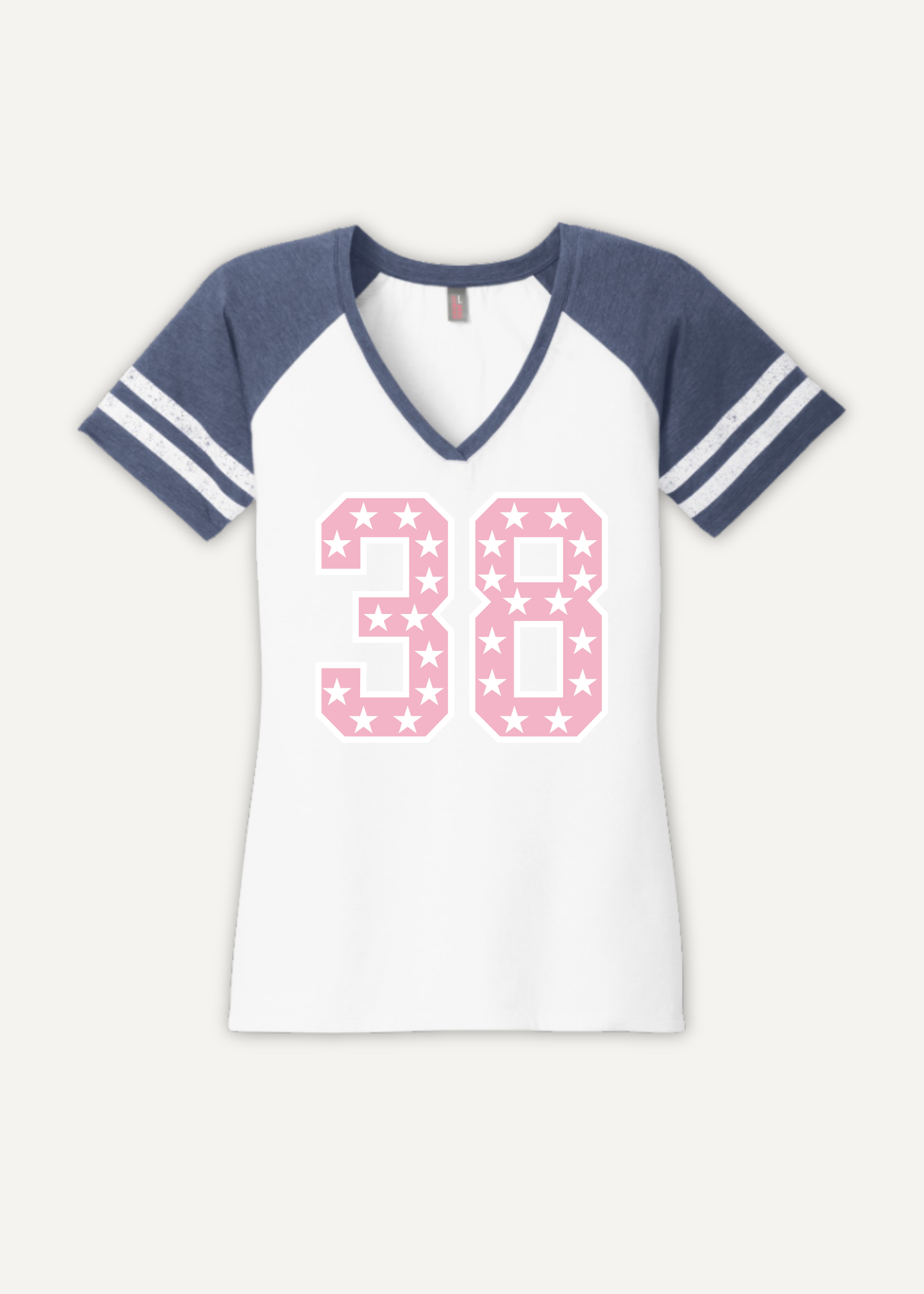 White v neck t-shirt with blue sleeves and pink star pattern on number 38