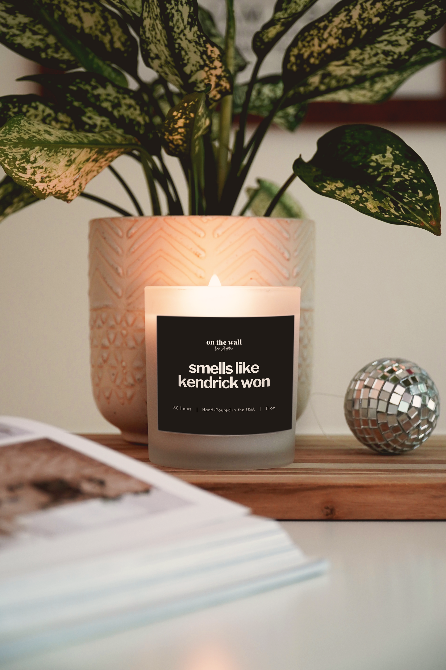 smells like kendrick won candle displayed in home