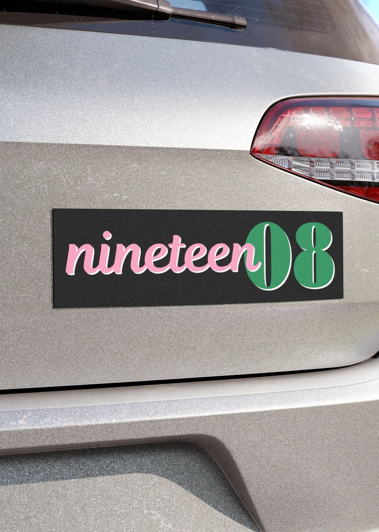 pink and green nineteen 08 magnet