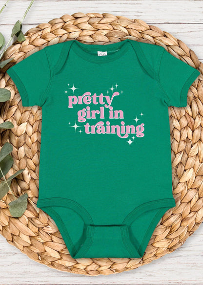 future aka legacy - pink and green baby onesie