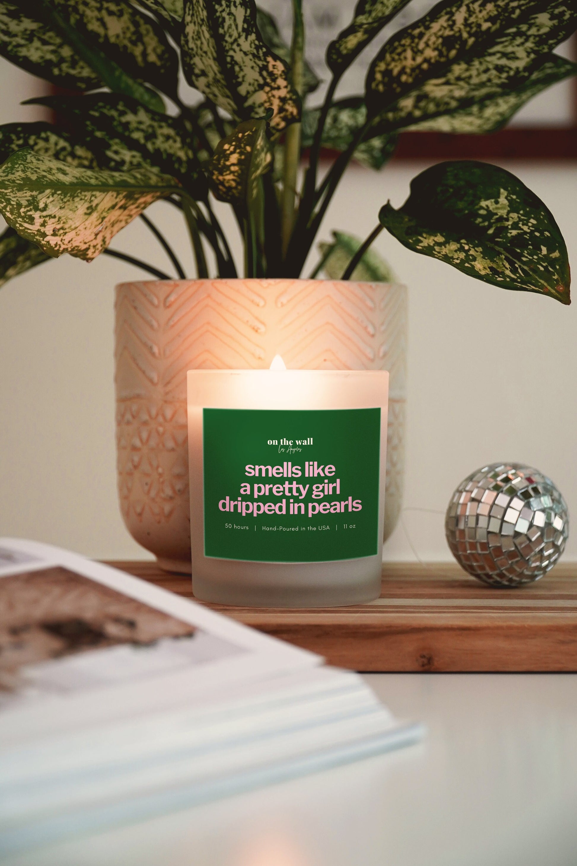 smells like a pretty girl dripped in pearls pink and green candle