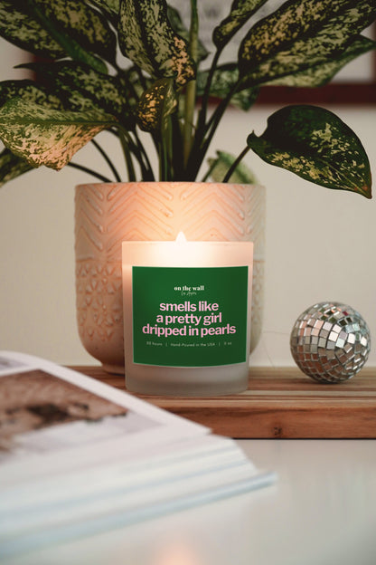 smells like a pretty girl dripped in pearls pink and green candle