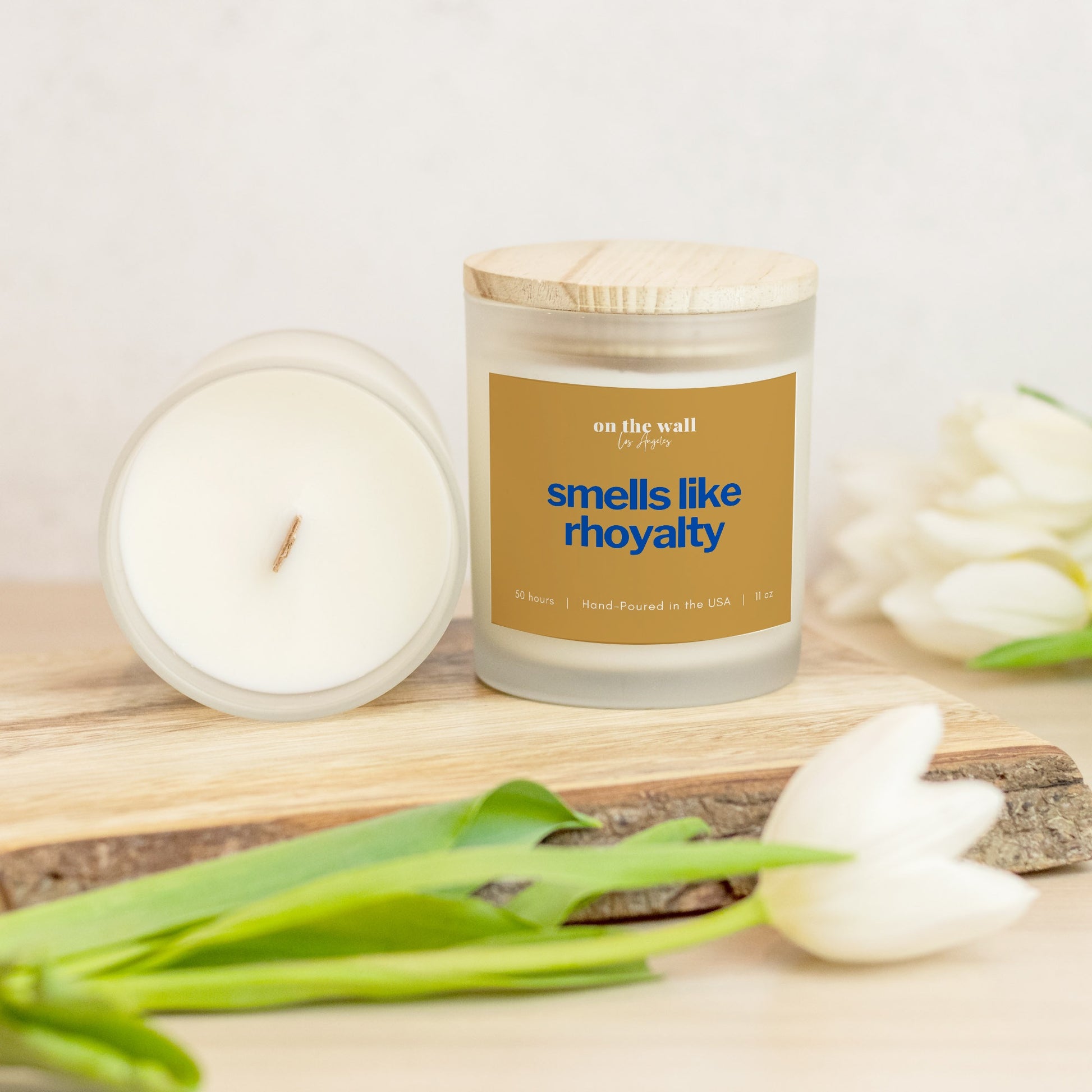 smells like rhoyalty candle blue and gold crossing gift