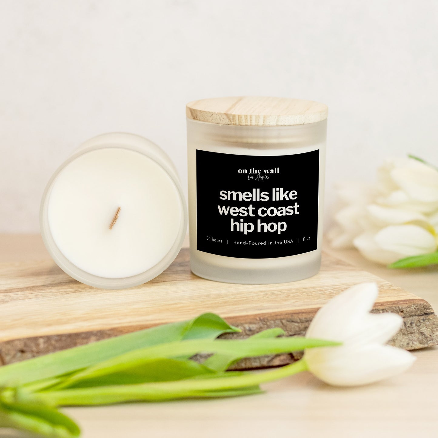 smells like west coast hip hop candle with lid on